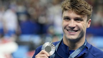 Jul 30, 2024; Nanterre, France; Bobby Finke (USA) in the men’s 800-meter freestyle medal ceremony during the Paris 2024 Olympic Summer Games at Paris La Défense Arena. Mandatory Credit: Grace Hollars-USA TODAY Sports