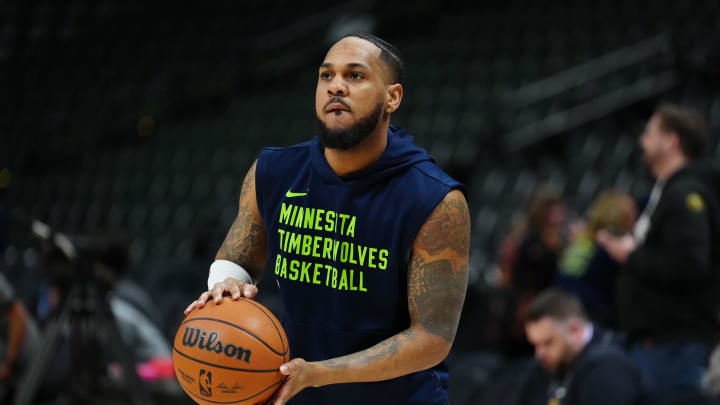 Apr 10, 2024; Denver, Colorado, USA; Minnesota Timberwolves guard Monte Morris (23) before the game against the Denver Nuggets at Ball Arena. Mandatory Credit: Ron Chenoy-USA TODAY Sports
