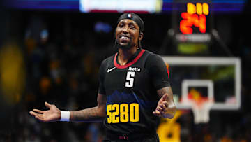 Nov 3, 2023; Denver, Colorado, USA; Denver Nuggets guard Kentavious Caldwell-Pope (5) reacts in the second half against the Dallas Mavericks at Ball Arena. Mandatory Credit: Ron Chenoy-Imagn Images