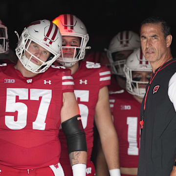 Oct 18, 2025; Madison, Wisconsin, USA;  Wisconsin Badgers head coach Luke Fickell during warmups prior to the game against the Ohio State Buckeyes at Camp Randall Stadium.