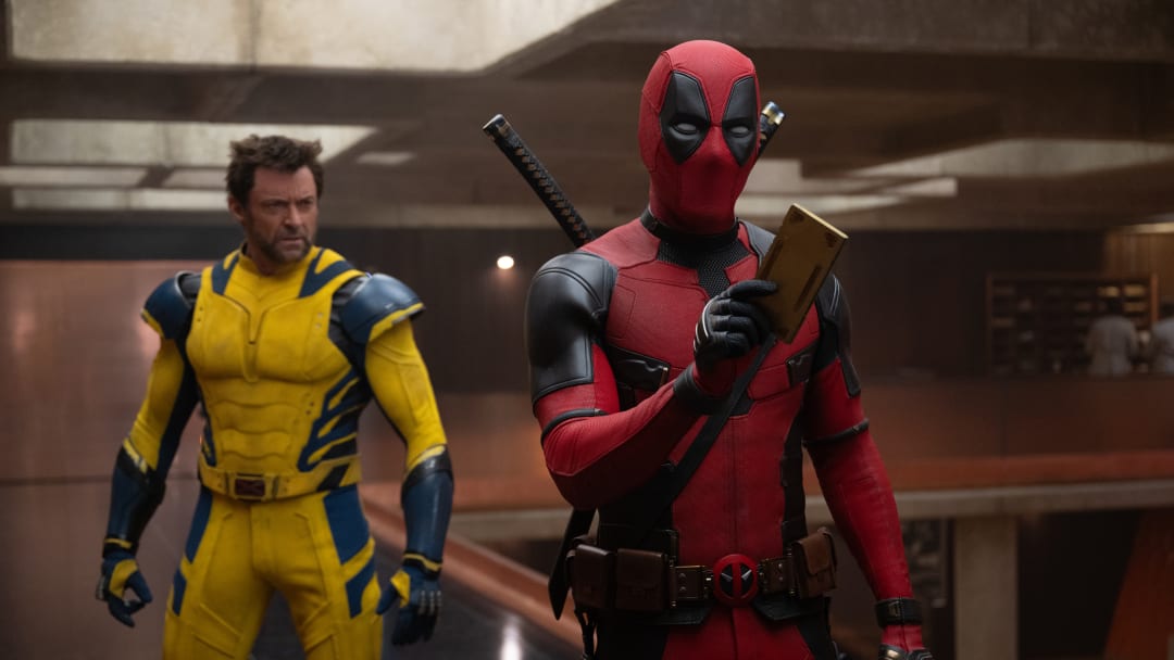 (L-R): Hugh Jackman as Wolverine/Logan and Ryan Reynolds as Deadpool/Wade Wilson in 20th Century Studios/Marvel Studios' DEADPOOL & WOLVERINE. Photo by Jay Maidment. © 2024 20th Century Studios / © and ™ 2024 MARVEL.