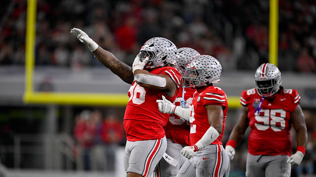 Dec 31, 2025; Arlington, TX, USA; Ohio State Buckeyes defensive end Eddrick Houston (96) celebrates during the 2025 Cotton Bowl and quarterfinal game of the College Football Playoff at AT&T Stadium. Mandatory Credit: Jerome Miron-Imagn Images