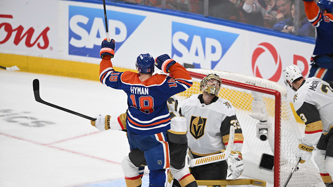 Edmonton Oilers left winger Zach Hyman (18) reacts to a goal on Vegas Golden Knights goalie Adin Hill (33)