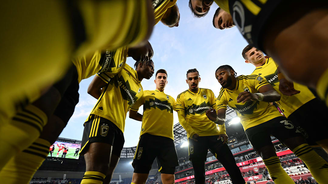 Nov 3, 2024; Harrison, New Jersey, USA; The Columbus Crew starting 11 huddle prior to a match against the New York Red Bulls in a 2024 MLS Cup Playoffs Round One matchat Red Bull Arena. Mandatory Credit: Mark Smith-Imagn Images
