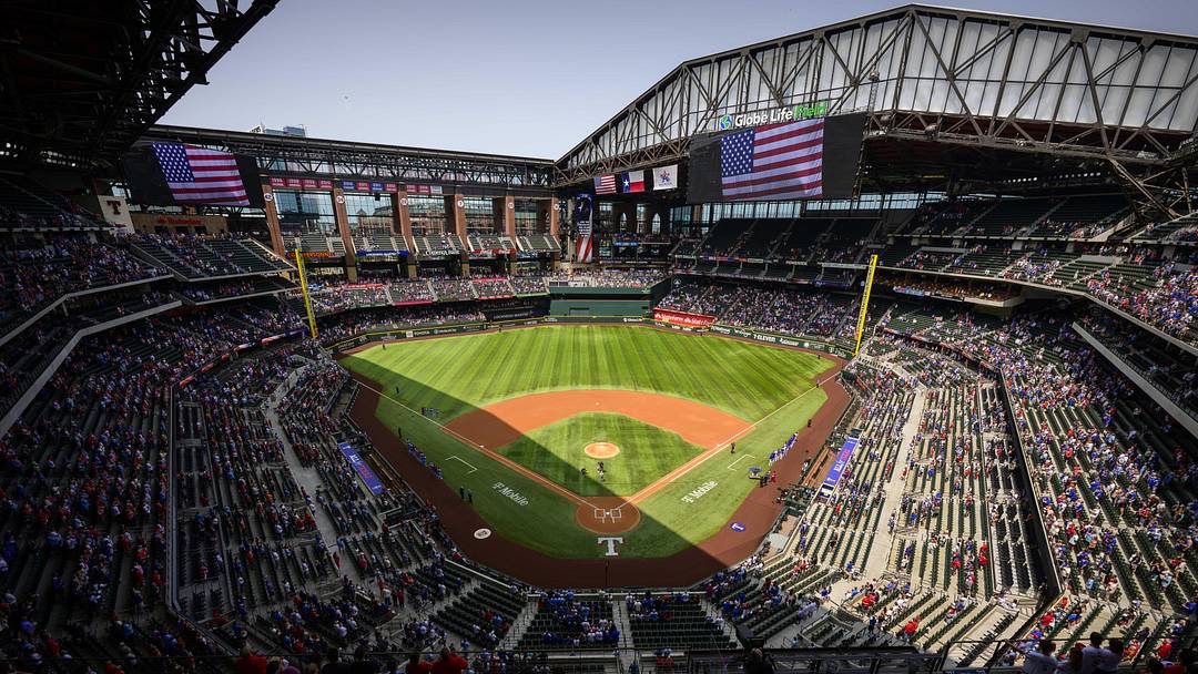 A view of the open roof, the field, and the American flag before a game at Globe Life Field. Mandatory