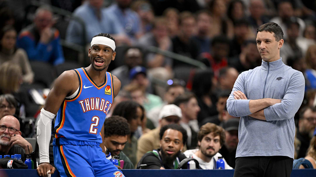 Mar 1, 2026; Dallas, Texas, USA; Oklahoma City Thunder guard Shai Gilgeous-Alexander (2) and head coach Mark Daigneault look on during the second quarter against the Dallas Mavericks at the American Airlines Center. Mandatory Credit: Jerome Miron-Imagn Images
