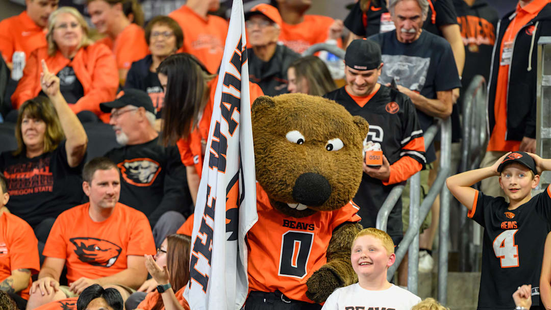 Sep 26, 2025; Corvallis, Oregon, USA; Oregon State Beavers mascot Benny Beaver interacts with fans during the second quarter against the Houston Cougars at Reser Stadium. Mandatory Credit: Craig Strobeck-Imagn Images