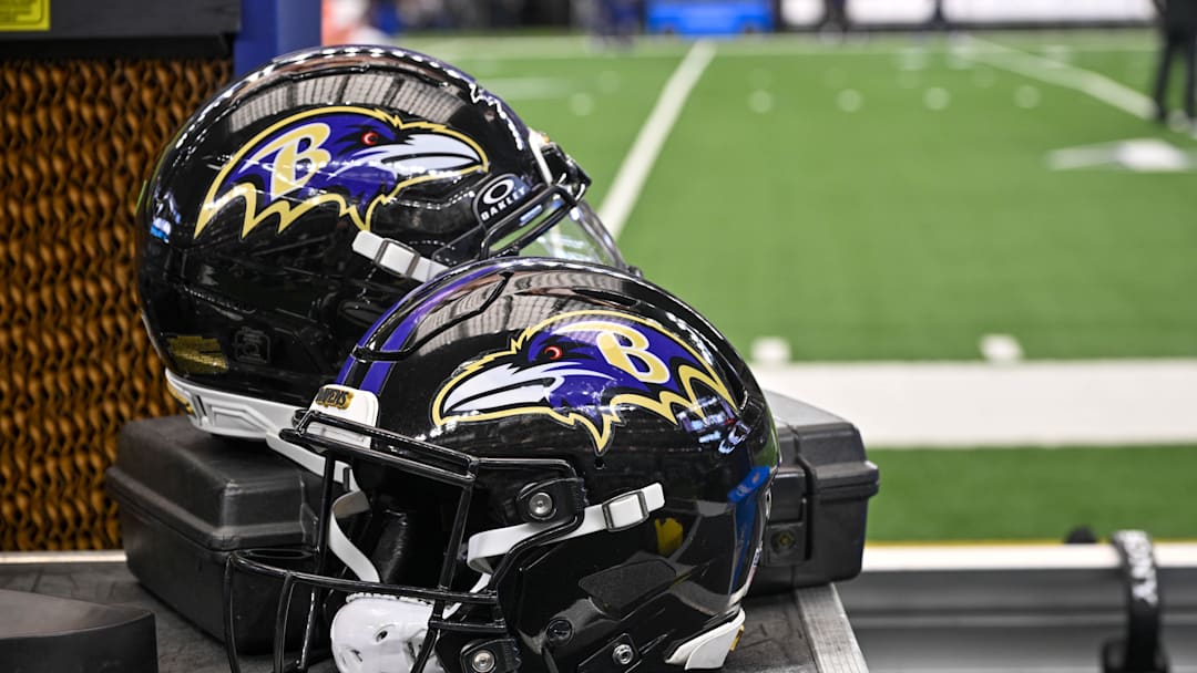 Aug 16, 2025; Arlington, Texas, USA; A view of the Baltimore Ravens logo and helmets before the game between the Dallas Cowboys and the Baltimore Ravens at AT&T Stadium. Mandatory Credit: Jerome Miron-Imagn Images