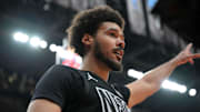 Jan 1, 2025; Toronto, Ontario, CAN;  Brooklyn Nets forward Cam Johnson (2) reacts after scoring a basket and earning a foul call against the Toronto Raptors in the first half at Scotiabank Arena. Mandatory Credit: Dan Hamilton-Imagn Images