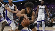 Nov 9, 2025; Sacramento, California, USA; Minnesota Timberwolves forward Joan Beringer (19) dives for the ball during the fourth quarter against the Sacramento Kings at Golden 1 Center. Mandatory Credit: Justine Willard-Imagn Images