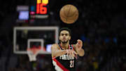 Apr 11, 2025; Portland, Oregon, USA; Portland Trail Blazers guard Rayan Rupert (21) passes the ball during the second half against the Golden State Warriors at Moda Center. Mandatory Credit: Troy Wayrynen-Imagn Images
