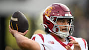 Sep 13, 2025; West Lafayette, Indiana, USA; Southern California Trojans quarterback Jayden Maiava (14) warms up on the sidelines during the first quarter against the Purdue Boilermakers at Ross-Ade Stadium. Mandatory Credit: Marc Lebryk-Imagn Images