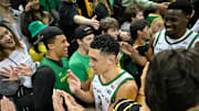 Mar 4, 2025; Eugene, Oregon, USA; Oregon Ducks guard Jackson Shelstad (3) is congratulated by fans after a 73-64 win against the Indiana Hoosiers at Matthew Knight Arena. Mandatory Credit: Craig Strobeck-Imagn Images