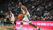 Oct 28, 2025; Hartford, CT, USA; Connecticut Huskies guard Silas Demary Jr. (2) dribbles the ball during the second half against the Michigan State Spartans at PeoplesBank Arena. Mandatory Credit: Mark Smith-Imagn Images