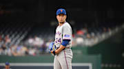 Aug 20, 2025; Washington, District of Columbia, USA; New York Mets starting pitcher Kodai Senga (34) prepares to throw a pitch against the Washington Nationals during the first inning at Nationals Park. 