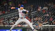 Aug 20, 2025; Washington, District of Columbia, USA; New York Mets relief pitcher Reed Garrett (75) throws a pitch against the Washington Nationals during the eighth inning at Nationals Park. Mandatory Credit: Rafael Suanes-Imagn Images