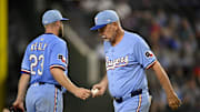 Sep 21, 2025; Arlington, Texas, USA; Texas Rangers manager Bruce Bochy (15) takes the ball from starting pitcher Merrill Kelly (23) as Kelly leaves the game against the Miami Marlins during the fifth inning at Globe Life Field. 