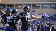 Oct 14, 2023; Fort Worth, Texas, USA; TCU Horned Frogs tight end Jared Wiley (19) celebrates during the game between the TCU Horned Frogs and the Brigham Young Cougars at Amon G. Carter Stadium. Mandatory Credit: Jerome Miron-Imagn Images