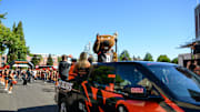 Sep 21, 2024; Corvallis, Oregon, USA; Oregon State Beavers mascot Benny leads the team arrival before a game against the Purdue Boilermakers at Reser Stadium. Mandatory Credit: Craig Strobeck-Imagn Images