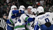 The Canucks trailed the Stars 5-2 with just two minutes left before scoring three stunning goals to force overtime and completed the comeback with an overtime victory.