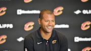 Koby Altman speaks to the media during a 2022 press conference.