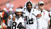 Cleveland Browns wide receiver Gage Larvadain and quarterback Shedeur Sanders walk off the field after the game between the Browns and the Los Angeles Rams at Huntington Bank Field.