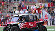 Oct 19, 2024; Pullman, Washington, USA; Washington State Cougars mascot Butch rides out onto the field before a game against the Hawaii Warriors at Gesa Field at Martin Stadium. Mandatory Credit: James Snook-Imagn Images
