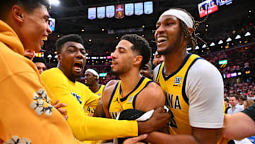 The Indiana Pacers celebrate Tyrese Haliburton's (center) game-winning shot with 1.1 seconds remaining in Game 2 of the Eastern Conference Semifinals.