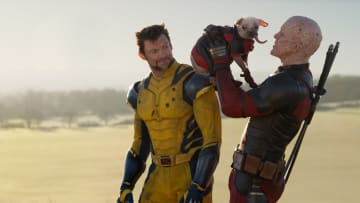 (L-R): Hugh Jackman as Wolverine/Logan, Dogpool, and Ryan Reynolds as Deadpool/Wade Wilson in 20th Century Studios/Marvel Studios' DEADPOOL & WOLVERINE. Photo by Jay Maidment. © 2024 20th Century Studios / © and ™ 2024 MARVEL.