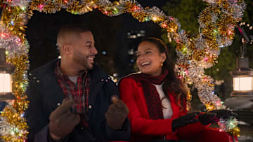 Meet Me Next Christmas. (L to R) Devale Ellis as Teddy and Christina Milian as Layla in Meet Me Next Christmas. 