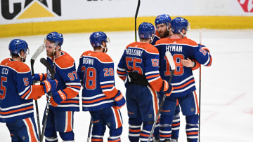 Edmonton Oilers players celebrate their win