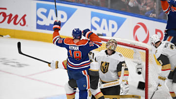 Edmonton Oilers left winger Zach Hyman (18) reacts to a goal on Vegas Golden Knights goalie Adin Hill (33)