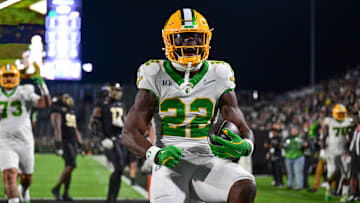 Oct 18, 2024; West Lafayette, Indiana, USA; Oregon Ducks running back Jay Harris (22) celebrates scoring a touchdown during the second half against the Purdue Boilermakers at Ross-Ade Stadium. Mandatory Credit: Marc Lebryk-Imagn Images