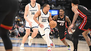 Mar 15, 2025; Memphis, Tennessee, USA; Memphis Grizzlies shooting guard Desmond Bane (22) drives through the middle of the lane in the third quarter of the game against the Miami Heat at FedExForum. Mandatory Credit: Matthew Smith-Imagn Images