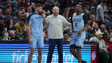 Mar 19, 2025; Portland, Oregon, USA; Memphis Grizzlies head coach Taylor Jenkins talks to guard John Konchar (46), left, and guard Vince Williams Jr. (5) during the second half against the Portland Trail Blazers at Moda Center. Mandatory Credit: Troy Wayrynen-Imagn Images