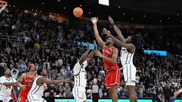 Dec 20, 2024; Providence, Rhode Island, USA; St. John's basketball forward Zuby Ejiofor (24) scores in the final seconds of the second half to beat the Providence Friars at Amica Mutual Pavilion. 