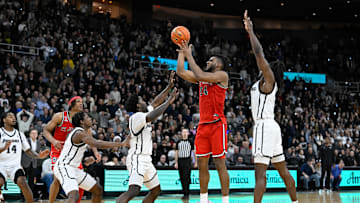 Dec 20, 2024; Providence, Rhode Island, USA; St. John's basketball forward Zuby Ejiofor (24) scores in the final seconds of the second half to beat the Providence Friars at Amica Mutual Pavilion. 