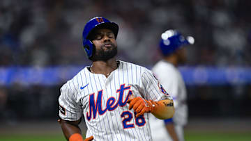 Aug 28, 2025; New York City, New York, USA; New York Mets outfielder Cedric Mullins (28) reacts after hitting a line drive for an out against the Miami Marlins during the sixth inning  at Citi Field. Mandatory Credit: John Jones-Imagn Images