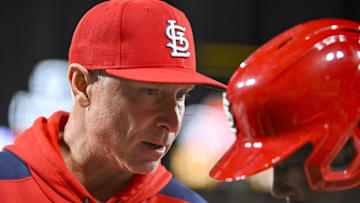 Apr 1, 2025; St. Louis, Missouri, USA;  St. Louis Cardinals hitting coach Brant Brown (73) talks with right fielder Jordan Walker (18) before an at bat against the Los Angeles Angels during the tenth inning at Busch Stadium. Mandatory Credit: Jeff Curry-Imagn Images