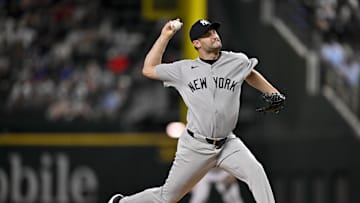 Aug 4, 2025; Arlington, Texas, USA; New York Yankees relief pitcher Jake Bird (59) pitches against the Texas Rangers during the tenth inning at Globe Life Field. Mandatory Credit: Jerome Miron-Imagn Images