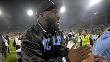 Nov 8, 2024; Pasadena, California, USA;  UCLA Bruins head coach DeShaun Foster claps as he leaves the field after defeating the Iowa Hawkeyes at the Rose Bowl. Mandatory Credit: Jayne Kamin-Oncea-Imagn Images