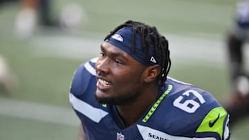 Seattle Seahawks offensive tackle Charles Cross during warmups prior to the game at Lumen Field.