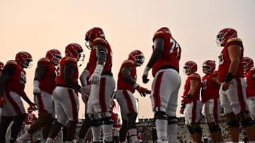 Sep 5, 2025; College Park, Maryland, USA;  The Maryland Terrapins greet each other as they warm up before a game against the Northern Illinois Huskies at SECU Stadium. Mandatory Credit: Jamie Sabau-Imagn Images