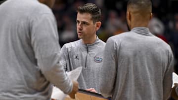 Mar 15, 2025; Nashville, TN, USA;  head coach Todd Golden talks with his coaches during a time out against the Alabama Crimson Tide during the second half at Bridgestone Arena