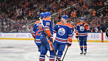 Nov 25, 2025; Edmonton, Alberta, CAN;  Edmonton Oilers centre Leon Draisaitl (29) and Oilers left winger Zach Hyman (18) celebrate a goal on the Dallas Stars during the third period at Rogers Place. Mandatory Credit: Walter Tychnowicz-Imagn Images