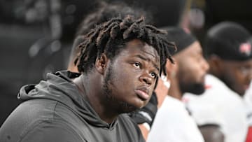 Tampa Bay Buccaneers defensive tackle Desmond Watson watches the action against the  Pittsburgh Steelers 