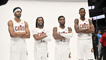 Sep 29, 2025; Cleveland, OH, USA;  Cleveland Cavaliers center Jarrett Allen (31) and guard Darius Garland (10) and guard Donovan Mitchell (45) and forward Evan Mobley (4) poses for a photo during media day at Rocket Arena. Mandatory Credit: Ken Blaze-Imagn Images
