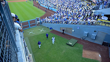Oct 28, 2025; Los Angeles, California, USA; Los Angeles Dodgers starting pitcher Shohei Ohtani (17) enters the bullpen to warm up for game four of the 2025 MLB World Series against the Toronto Blue Jays at Dodger Stadium. Mandatory Credit: Jayne Kamin-Oncea-Imagn Images