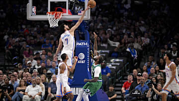 Oct 27, 2025; Dallas, Texas, USA; Oklahoma City Thunder center Chet Holmgren (7) blocks a shot by Dallas Mavericks forward Naji Marshall (13) during the second quarter at the American Airlines Center. Mandatory Credit: Jerome Miron-Imagn Images
