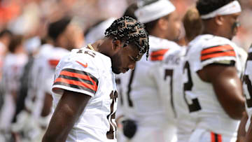 Cleveland Browns quarterback Shedeur Sanders listens to the national anthem before the Browns and the Los Angeles Rams game